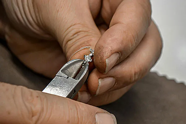 Diamond earrings restoration by jewelry experts