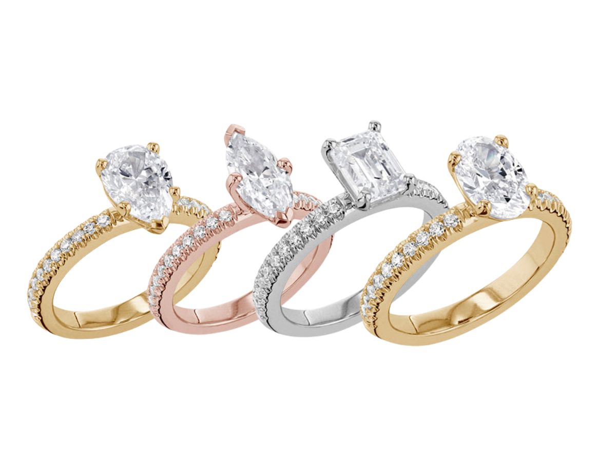 Four solitaire engagement rings in mixed metals