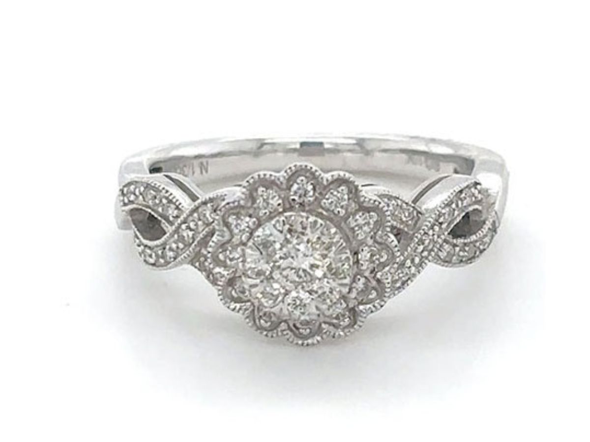 White gold ring with floral diamond halo setting