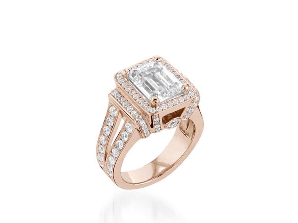 Rose gold ring with emerald-cut center diamond