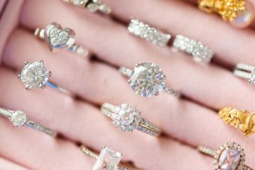 Assorted engagement rings in a pink jewelry box