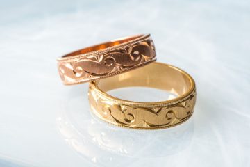 Pair of vintage engraved gold wedding bands