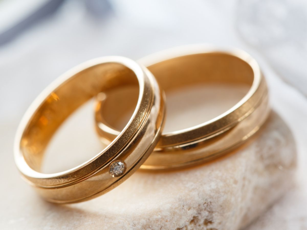 Gold wedding bands with diamond detail