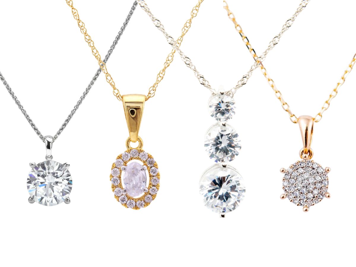 Assorted diamond necklaces in gold, rose gold, and silver chain settings.