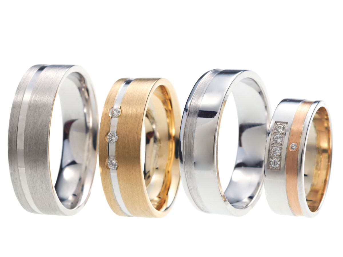 Matching wedding ring set featuring brushed and polished mixed metal designs