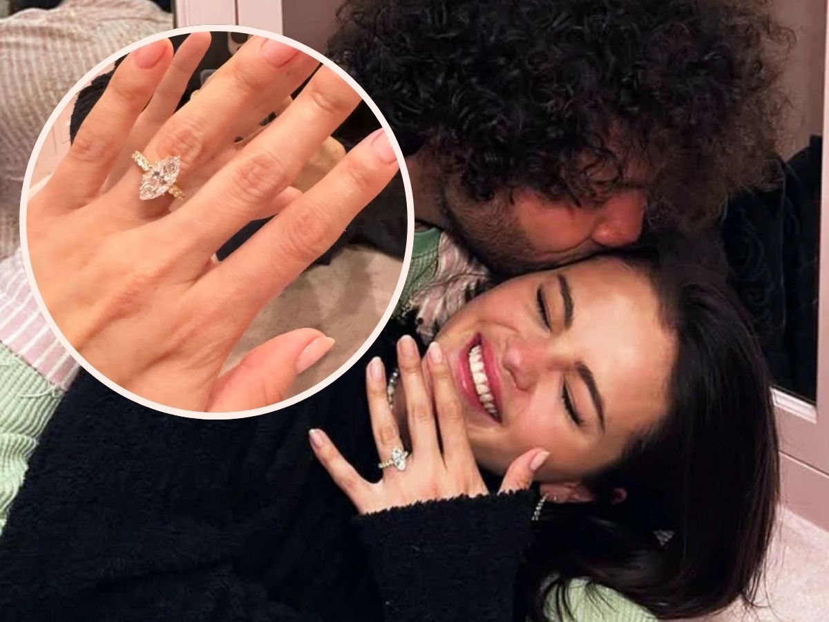 A celebrity couple, Selena Gomez and her husband, Benny Blanco, showing off a marquise diamond ring while sharing a sweet moment.