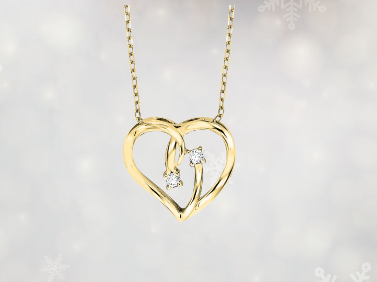 Yellow gold heart pendant necklace with intertwined curves and two diamonds
