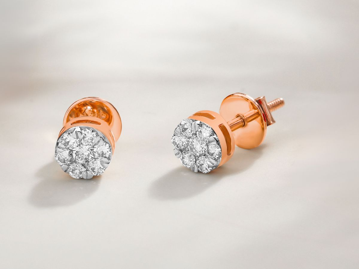 Rose gold diamond earrings with floral-inspired sparkling cluster design.