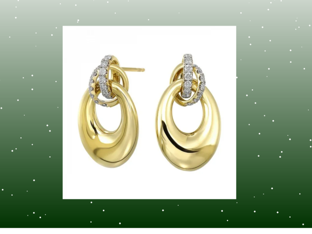 Festive gold diamond oval earrings on snowy green holiday backdrop