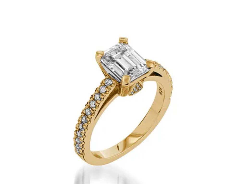 Gold emerald-cut diamond engagement ring