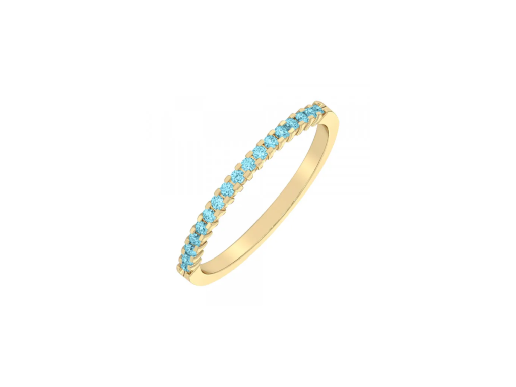 Yellow gold band with blue gemstones