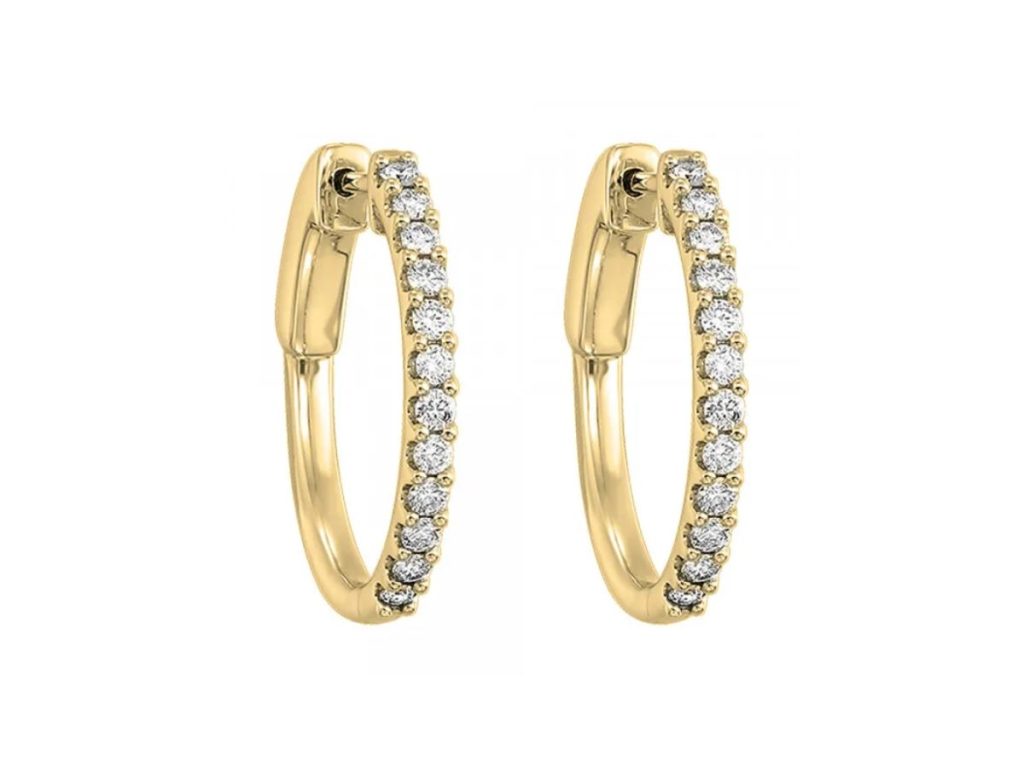 Yellow gold hoop earrings with diamond accents.
