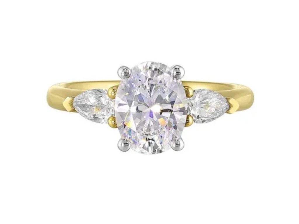 Oval diamond engagement ring with pavé band