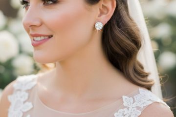 Bride wearing diamond stud earrings