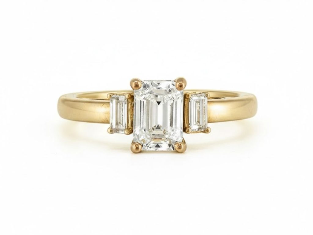 Emerald cut diamond three stone ring