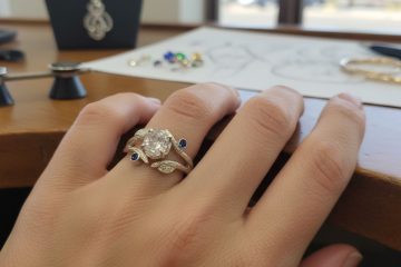 Oval diamond ring with sapphires