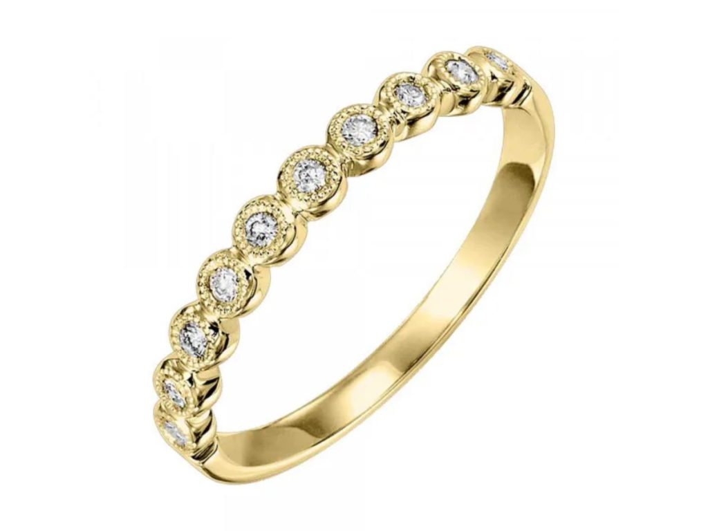 Yellow gold diamond stackable band with bezel accents