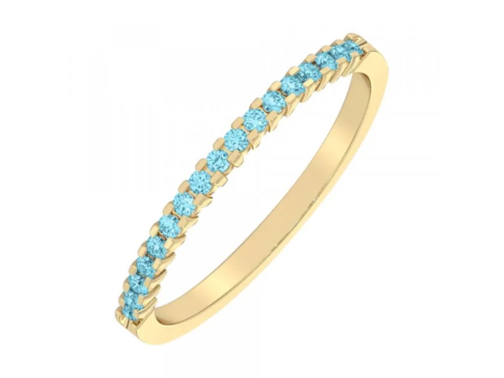 Yellow gold band with blue gemstones half eternity style