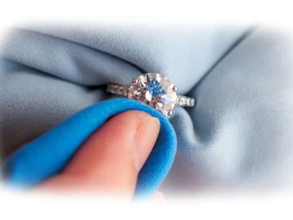 Polishing diamond ring with soft cloth