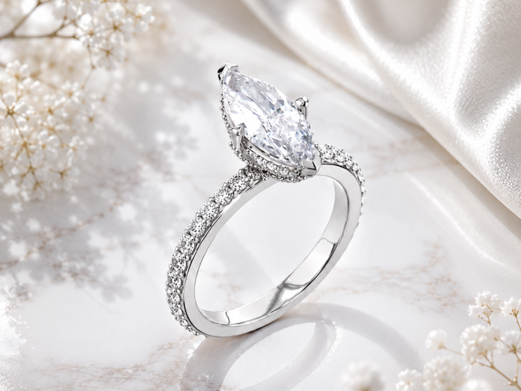 Marquise diamond engagement ring with pavé band