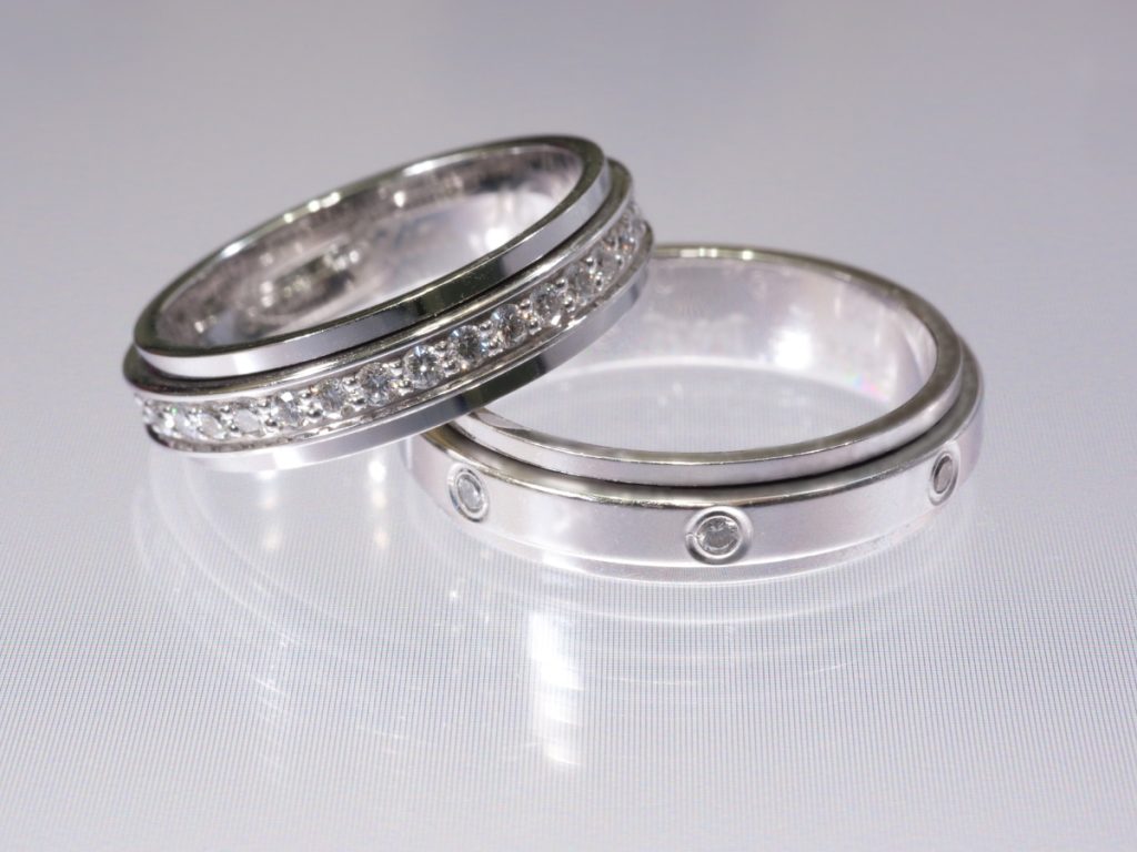 Silver diamond wedding bands with channel set stones