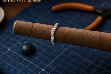 Curved diamond band shaped during jewelry repair
