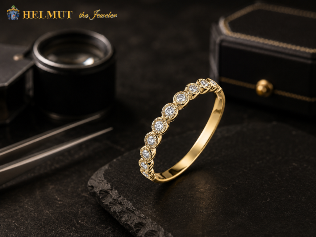 Gold diamond band with round bezel-set stones