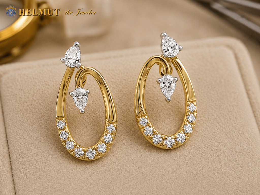 Gold diamond drop earrings with pear-shaped stones