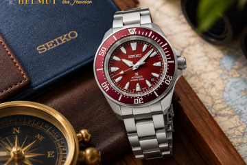 Red Seiko Prospex automatic dive watch with steel bracelet