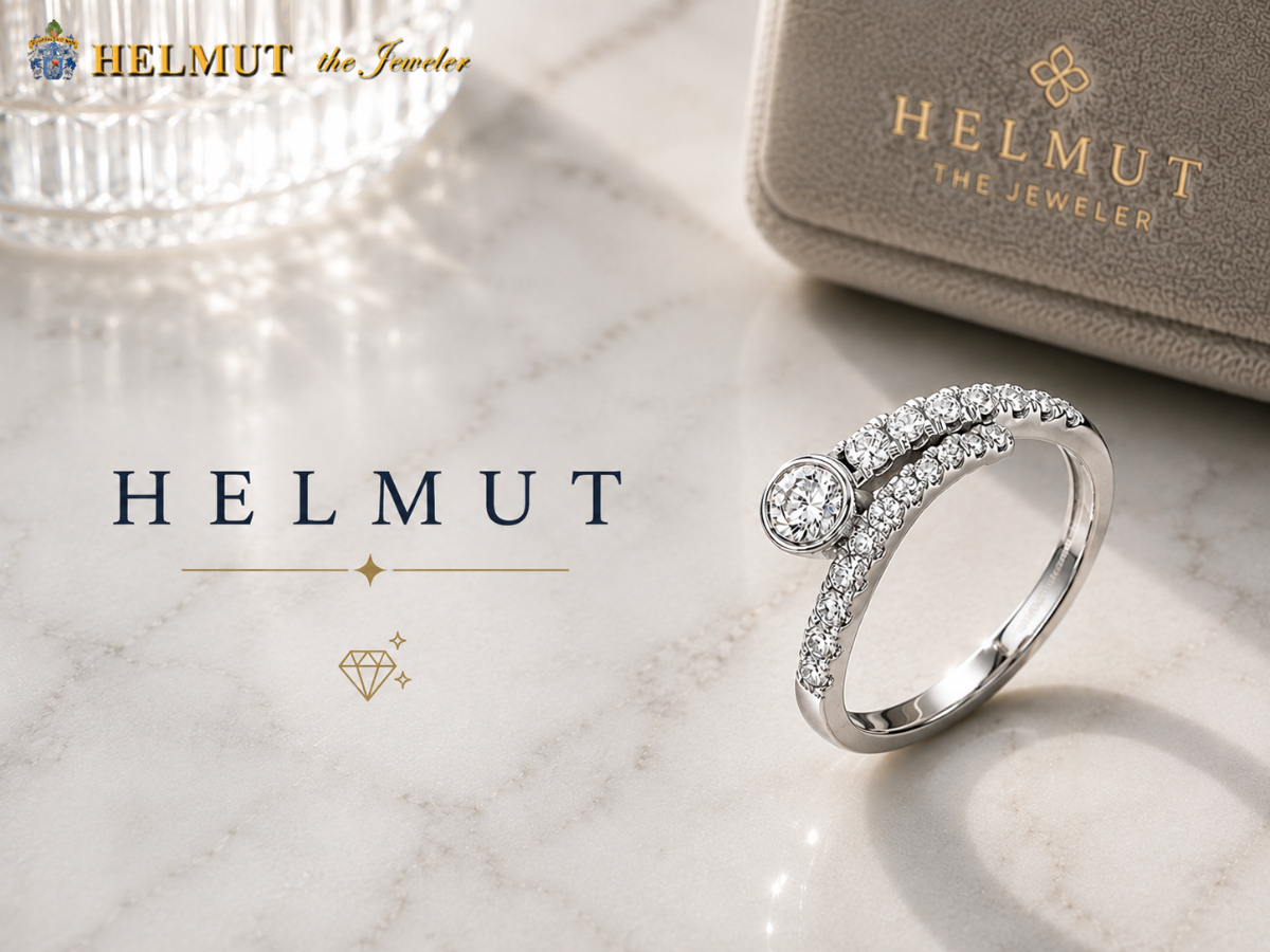 White gold diamond bypass ring on marble display