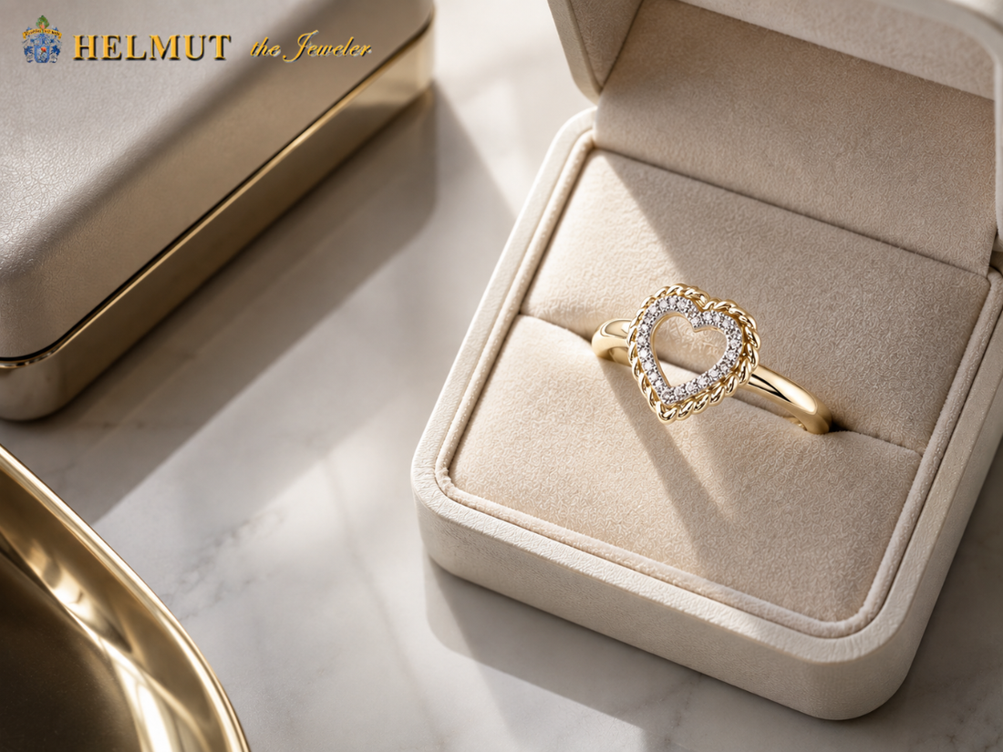 Gold heart diamond ring in a cream jewelry box