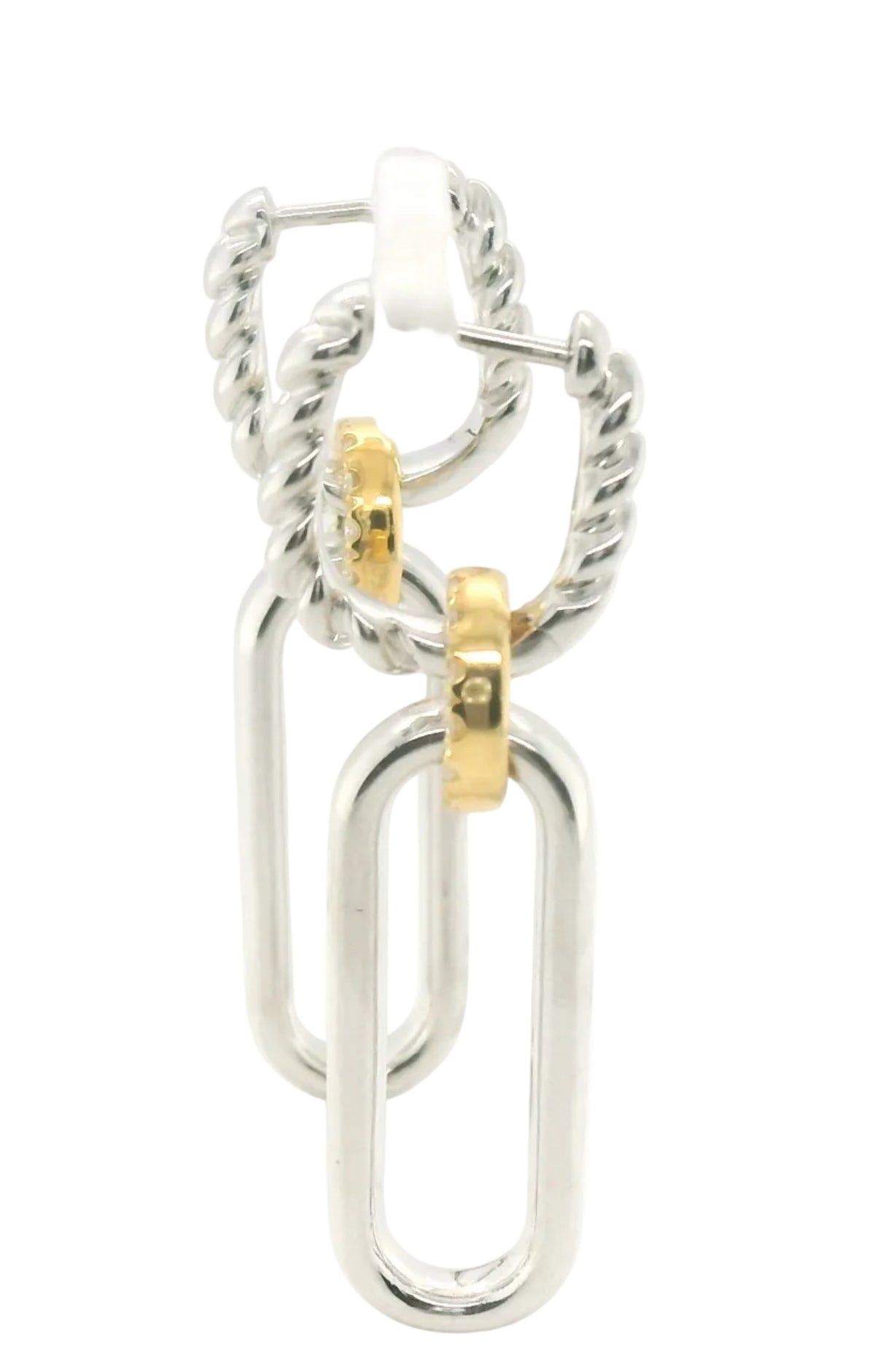 A pair of silver-toned drop earrings with a twisted rope design and polished oval links, accented by small gold-toned rings, shown on a white background.