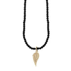 10k Gold Double Wing Pendant on 24 in. 3mm Onyx Beaded Necklace