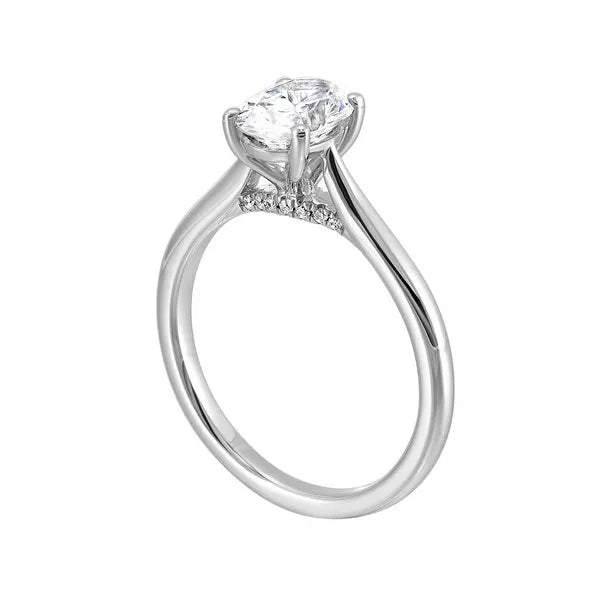 Sleek Four-Prong Oval Solitaire Ring