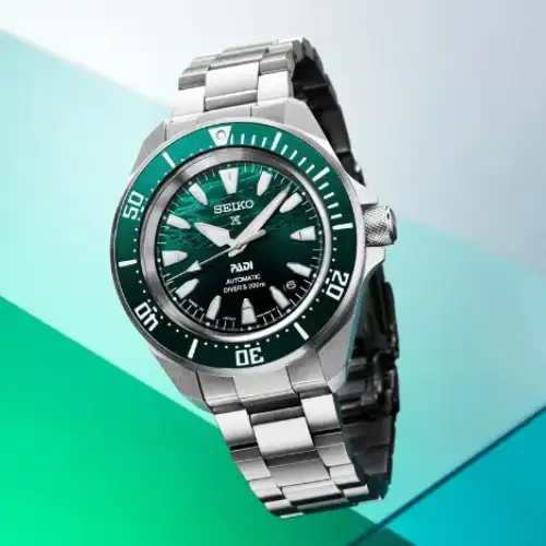 Seiko Prospex Automatic Diver PADI Special Edition with a green and blue dial.